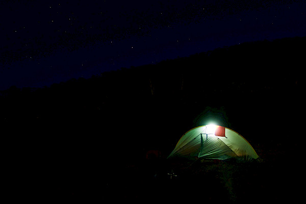 Tent at night with a light inside